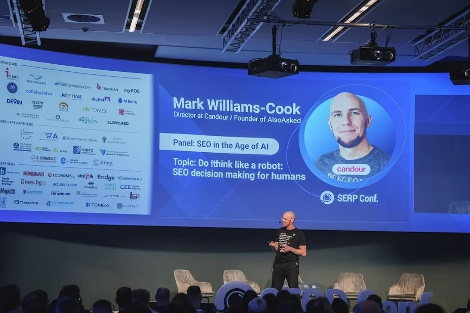 Mark Williams-Cook speaking on the 'SEO in the Age of AI' panel at SERP Conf